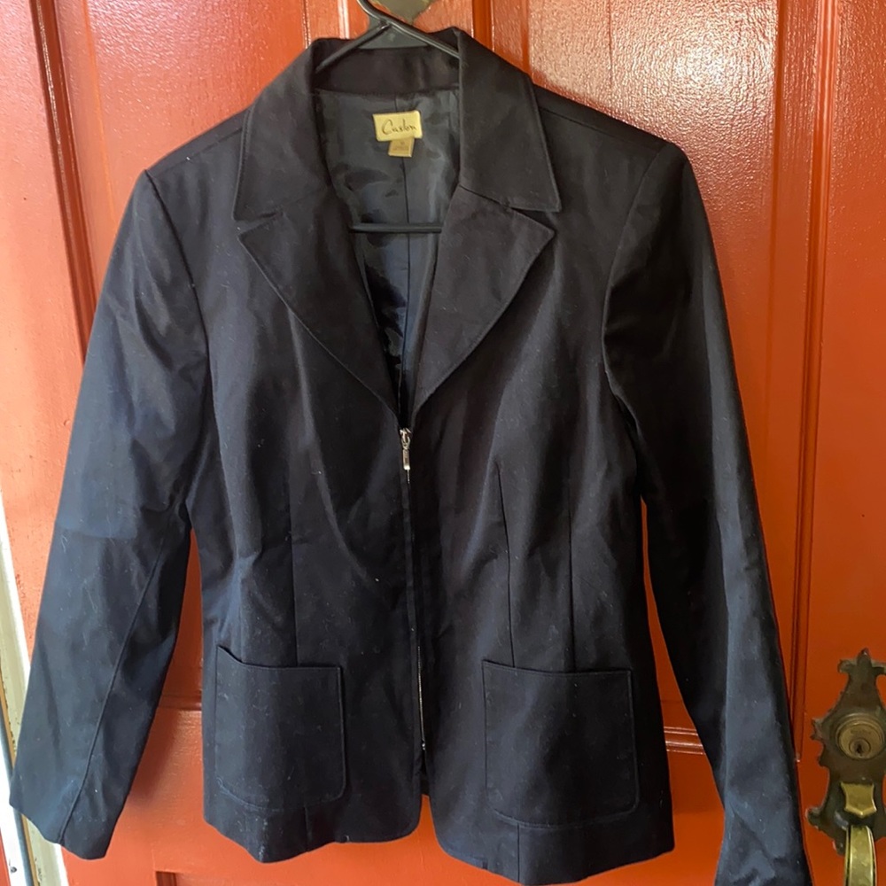 Black woman’s lined jacket with zipper.